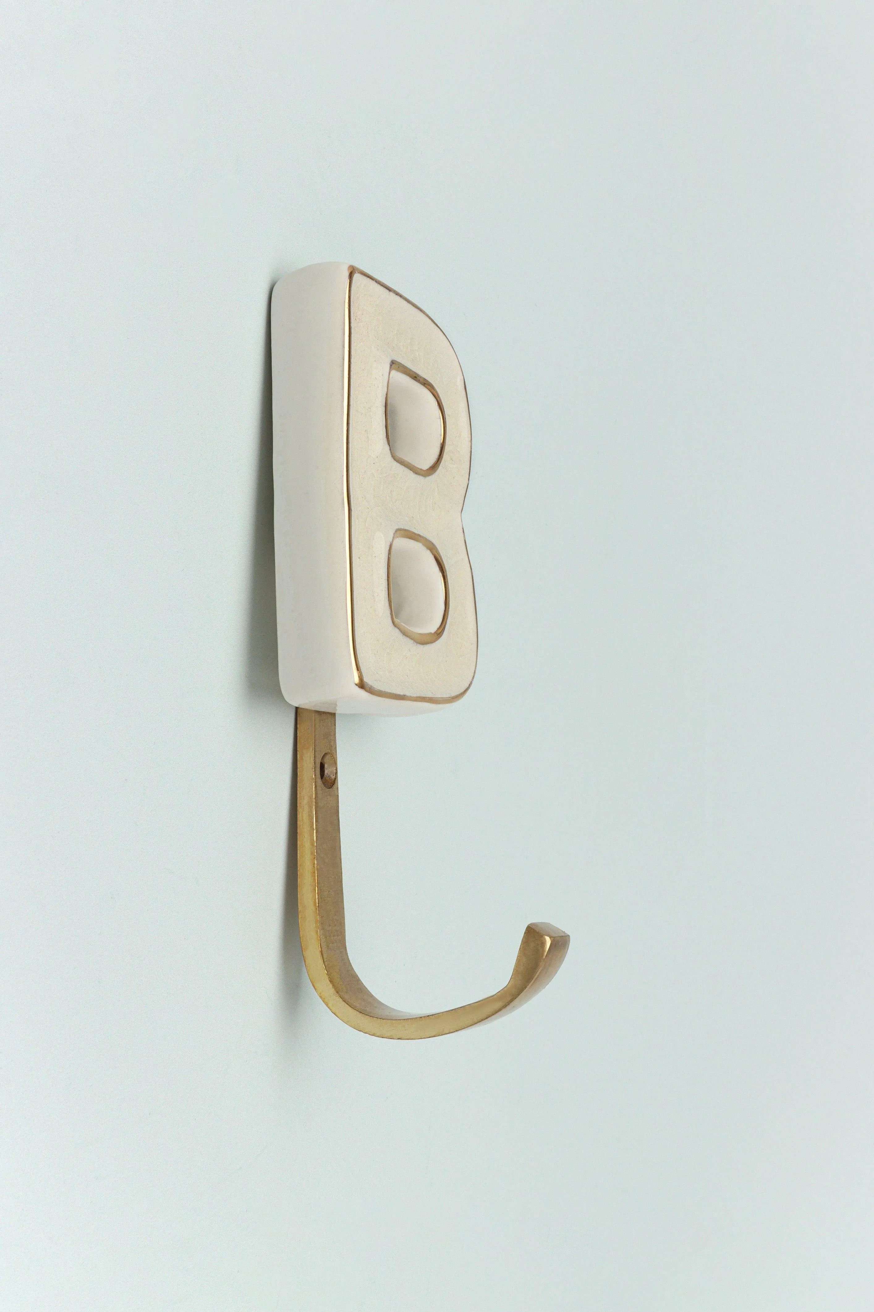 Alphabet Cream Crackle Glazed Hooks In Antique Brass