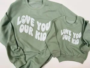 Our Albie ‘Love You Our Kid’ oversized sweatshirt for adults in cool green